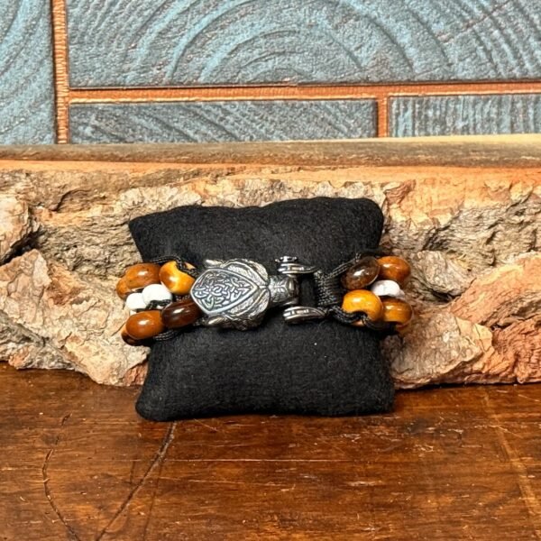 Thesaurus, Thesaurus edelstenen, edelstenen, Heerlijk Wormerveer, mannen armband, stoere armband, paracord, robuust, robuuste armband, uniek, gepersonaliseerd, gepersonaliseerde armband, stevige armband, tijgeroog, howliet, beren goed